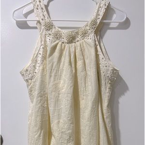 Never worn Theme mini dress! With hand woven beads around shoulder and neck area